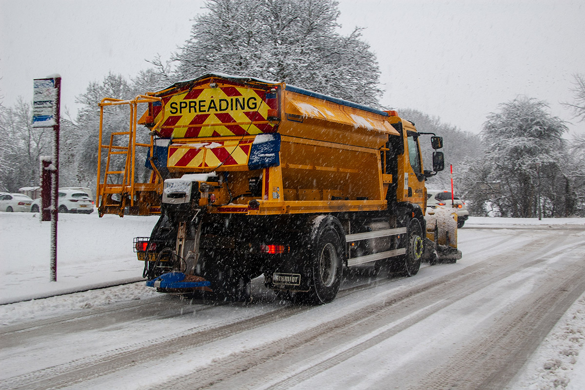road ice grit truck spreading